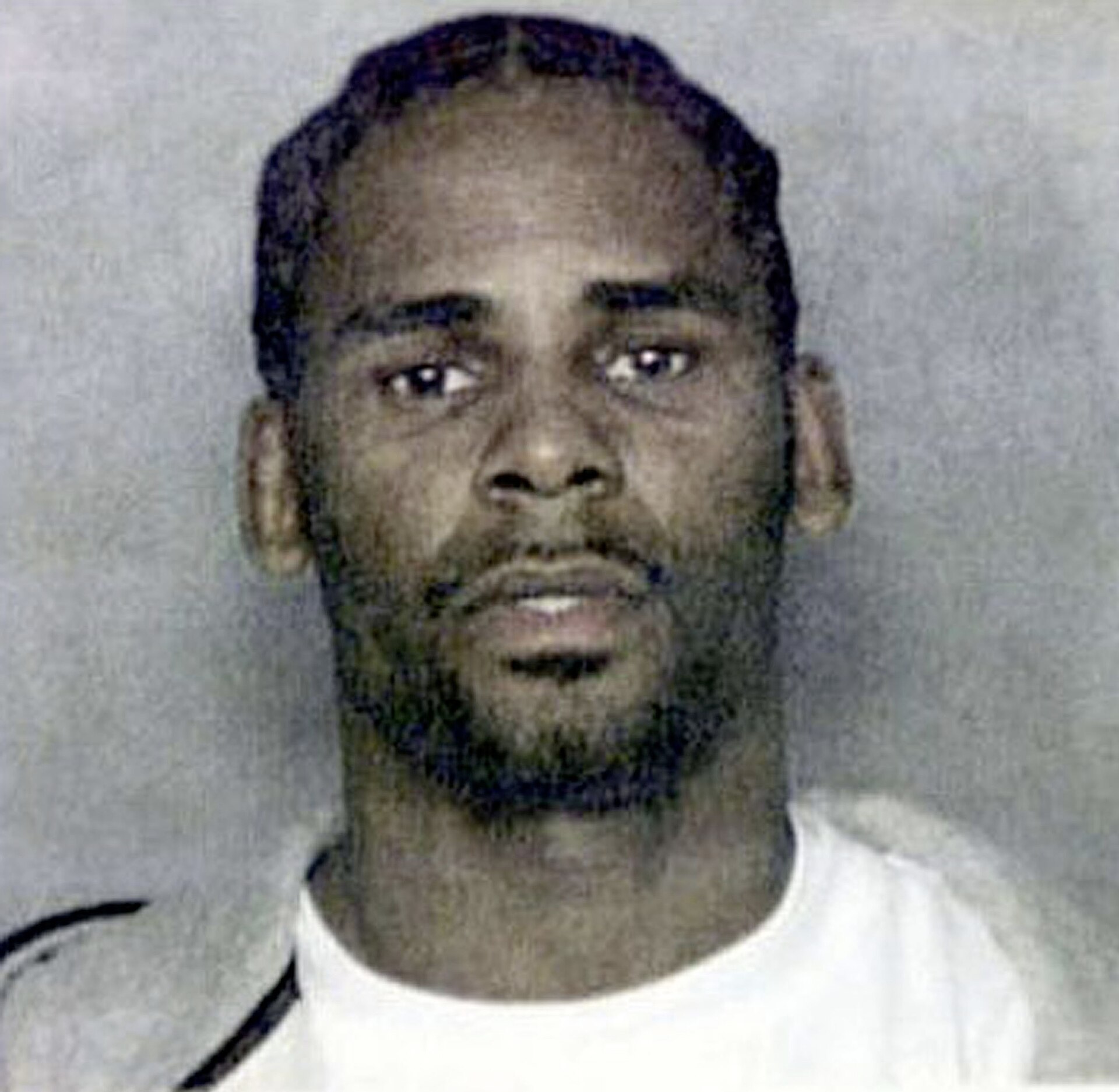 Imagem de referência de R. Kelly, descrito nos dados abertos como cantor estadunidense
