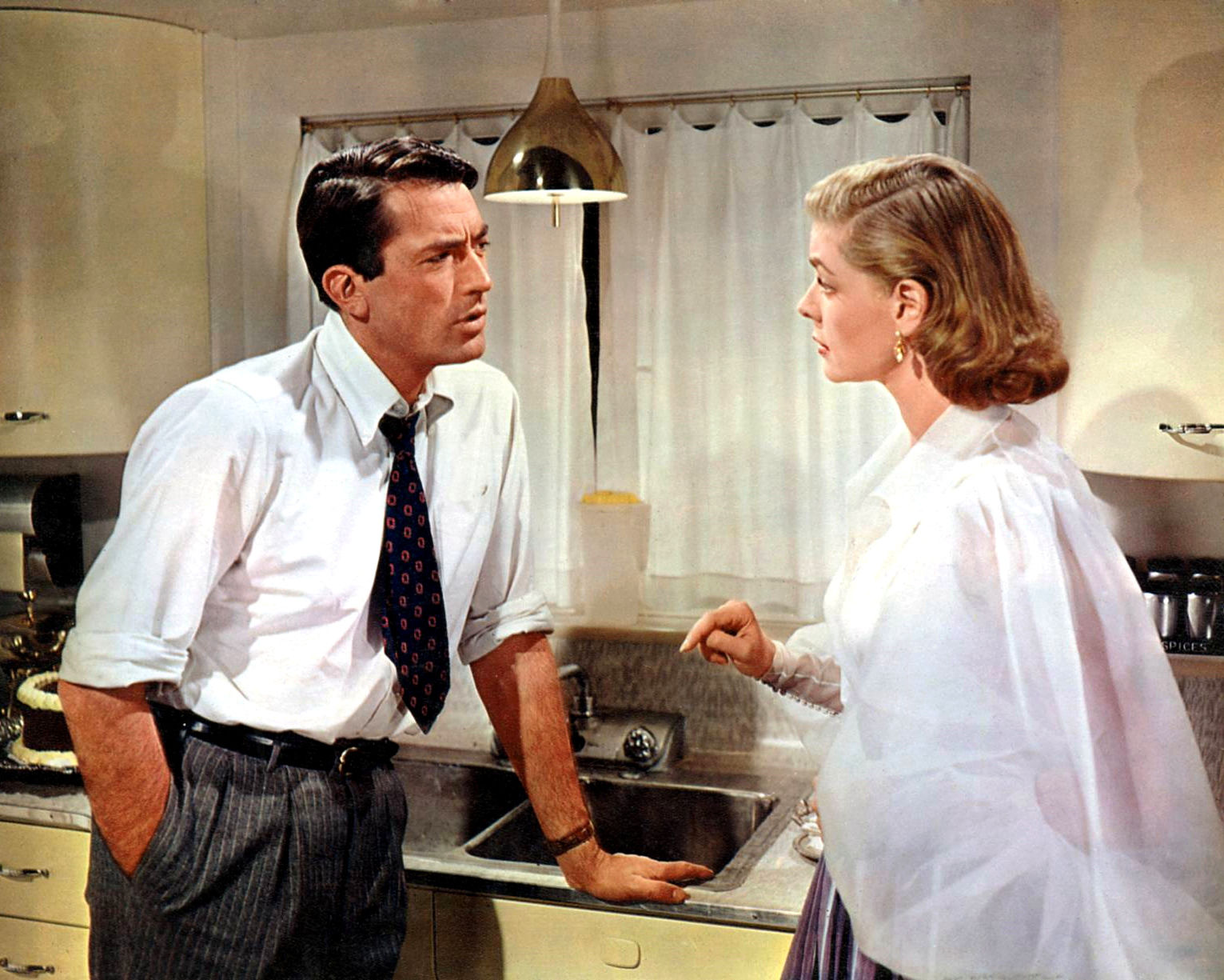 Imagem de referência de Designing Woman, descrito nos dados abertos como filme de 1957 dirigido por Vincente Minnelli
