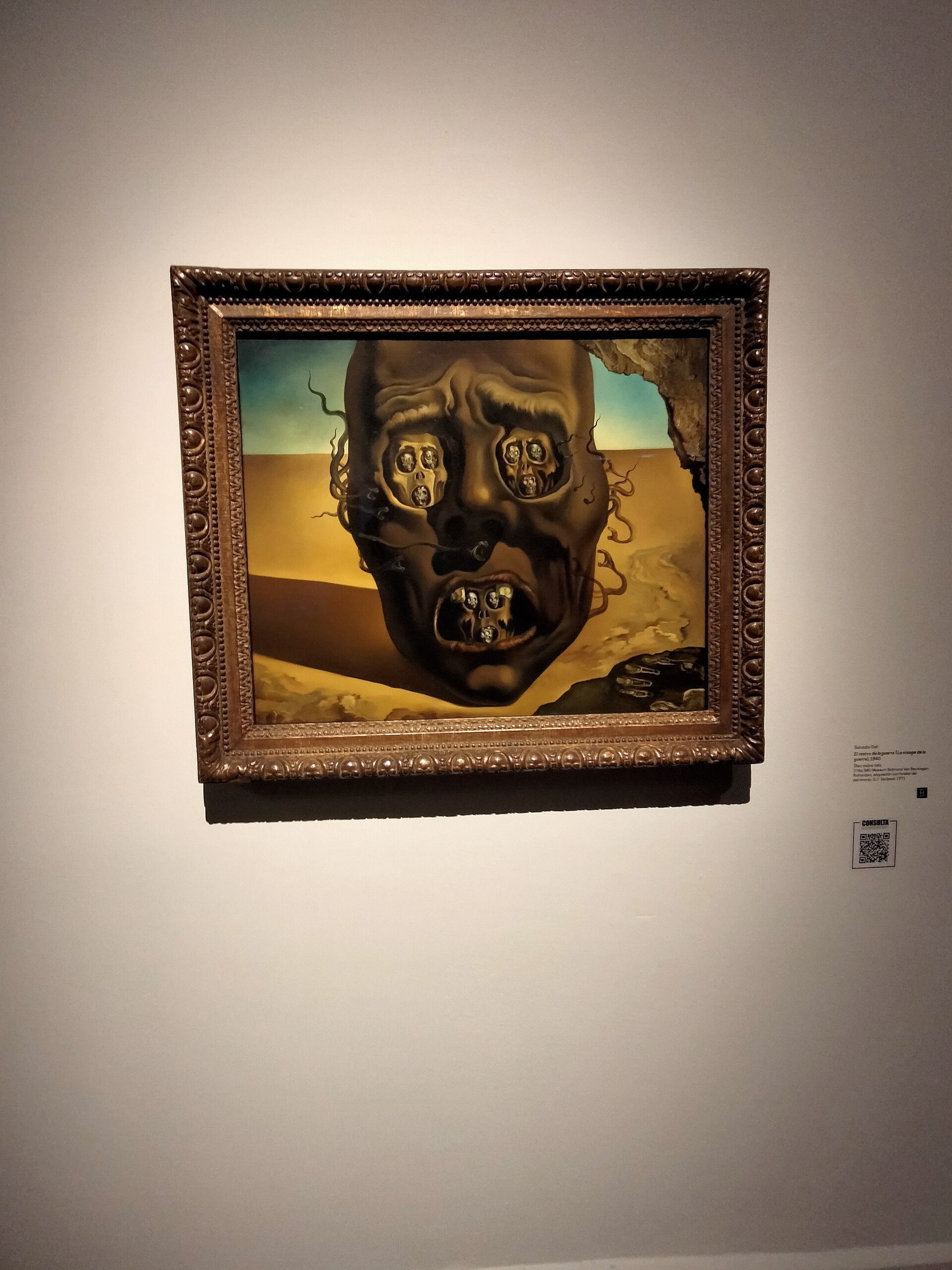 Imagem de referência de A Face da Guerra, descrito nos dados abertos como pintura de Salvador Dalí