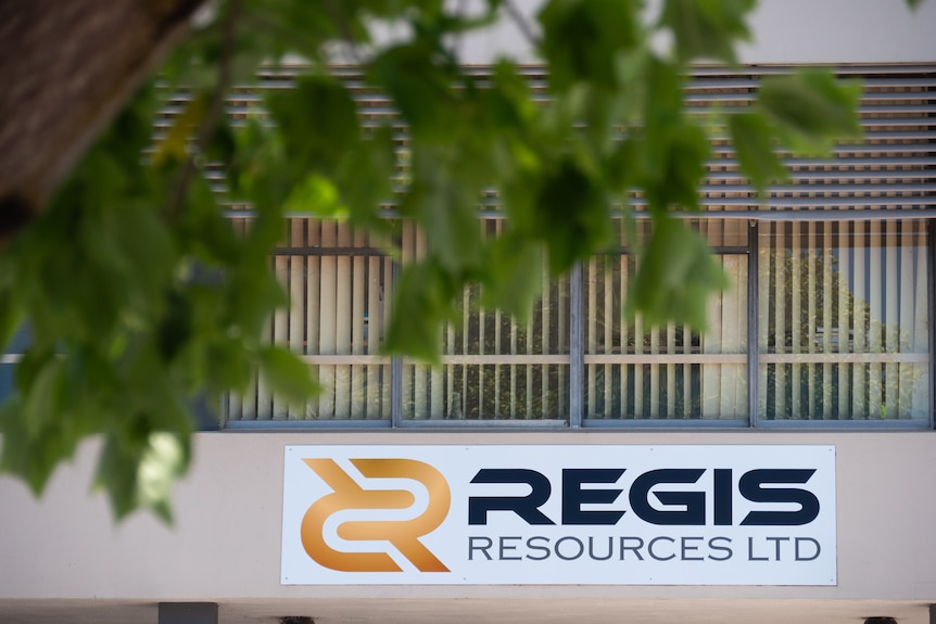 An office building with the sign 'regis resources ltd' on the door and front of the building.
